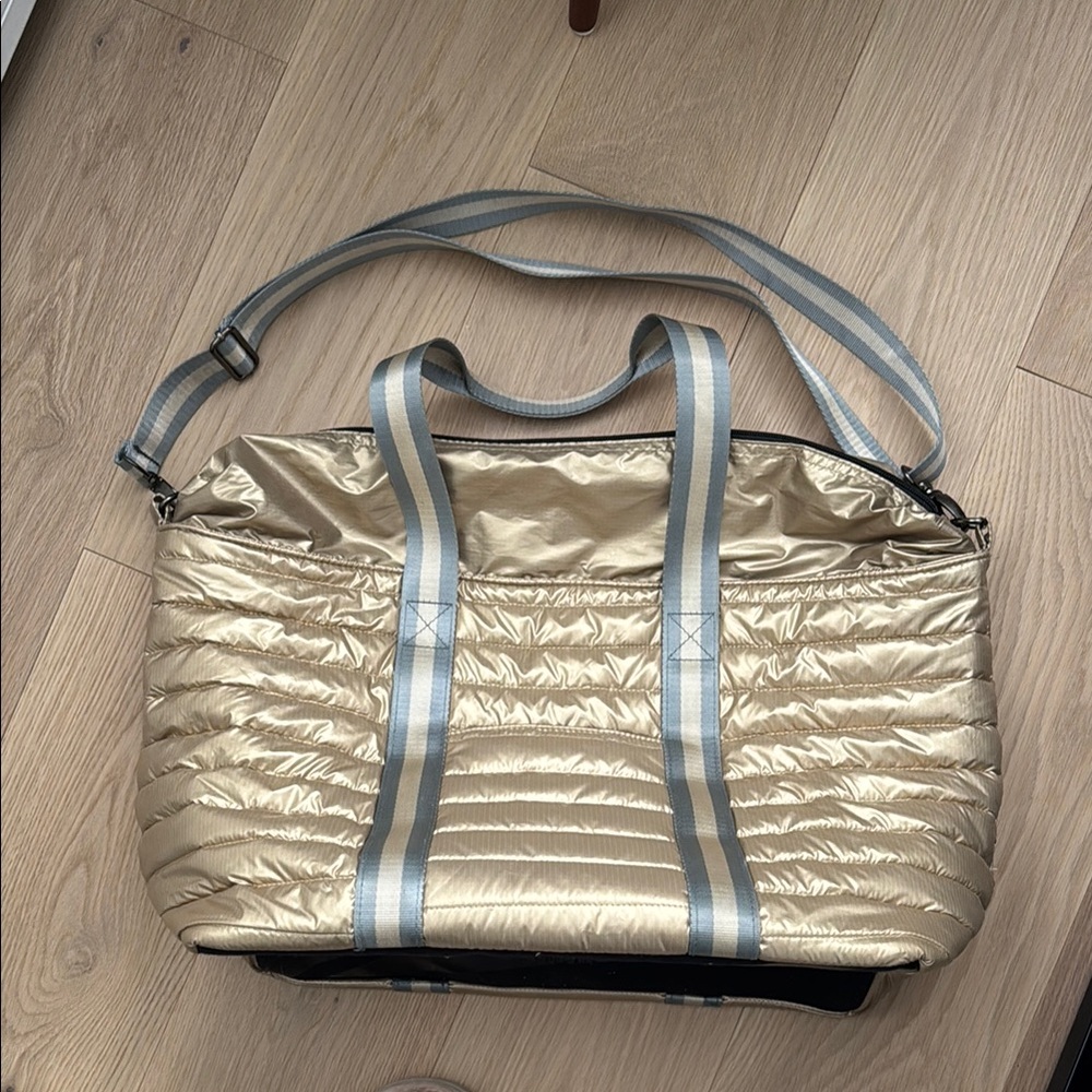 THINK ROYLN Metallic Gold Quilted Tote with Blue-Trim Straps